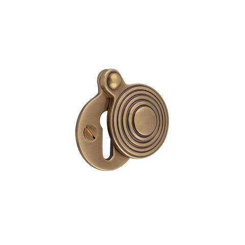 Round Reeded Lever Key Escutcheon - Shown in Very Light Aged