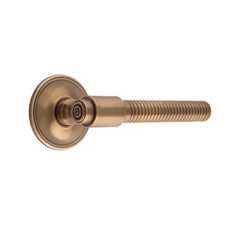 140mm Reeded Round Bar Lever Handle - Shown in Very Light Aged