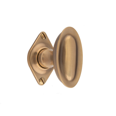 67mm x 36mm Raised Oval Mortice Knob - Shown in Very Light Aged